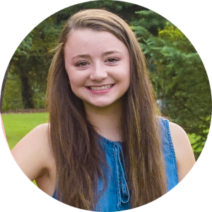 Teen orthodontic treatment patients smiling outside